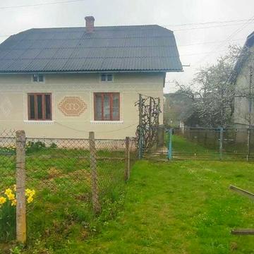 Продам будинок 70 м² з подвір’ям, садом та господарськими приміщеннями