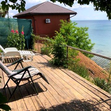 Будинок біля моря з власною терасою та видом на море
