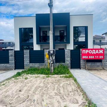 Будинок з автонавісом та терасою у Крюківщині
