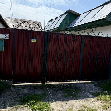 Будинок в селі Малютянка