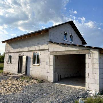 Компактний будинок, в районі, що розвивається