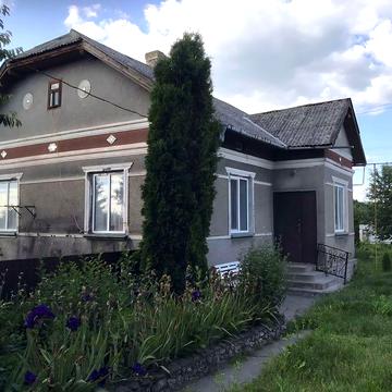 Продається затишний будинок із земельною ділянкою