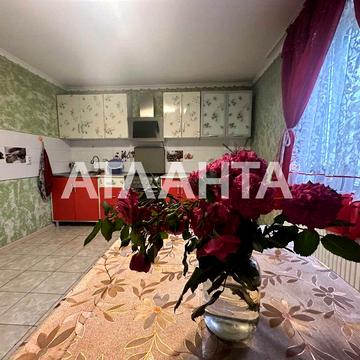 Перспективный дом с гаражом, беседкой, фруктовым садом.