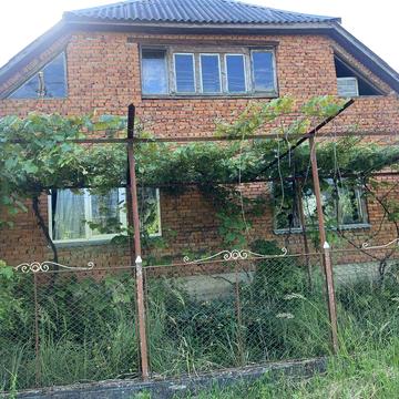 Продаж цегляного будинку