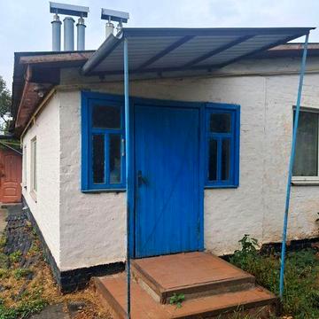 Продам квартиру у 3 квартирному будинку , селище Парафіївка.