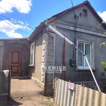 Будинок на 8 сотках землі  в Латовці