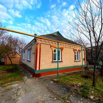 Продається просторий цегляний будинок у Тальному
