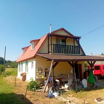 Продам новый дом в жилом состоянии