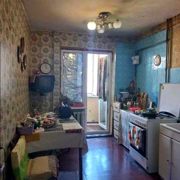 Продам 4 комнатную квартиру на Бреуса