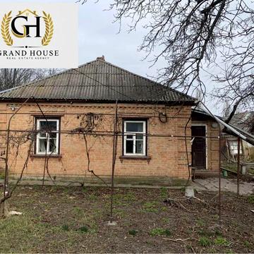 Продам будинок та земельну ділянку по вулиці Міхновського.