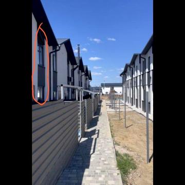 Альтернатива смарт-квартирі: компактний таунхаус з документами, власним подвірям і готовим проєктом
