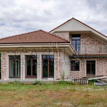 На продаж будинок у котеджному містечку «Северинівка» (Житомирська траса). Перша лінія - власний вихід до озера
