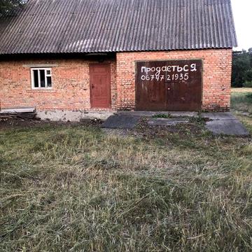 Продається врем’янка з гаражем, підвалом та земельною ділянкою 15 соток