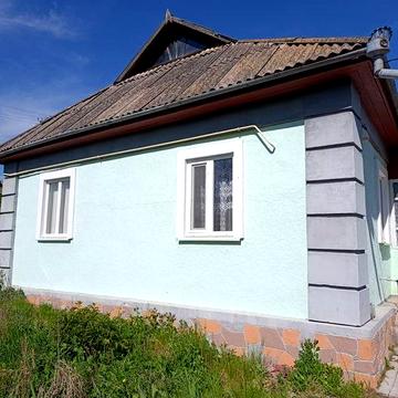Продається затишний будинок у с. Капустяни — 27 соток землі та всі комунікації!