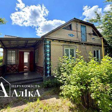 Продам будинок з великою земельною ділянкою