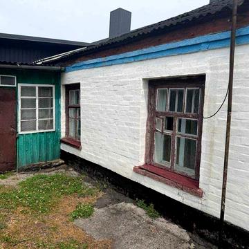 Продаж земельної ділянки з 1/4 будинку (23.3/100) в центрі Христинівки