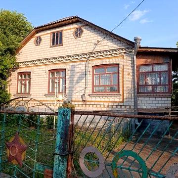 Добротний цегляний будинок у центрі смт Вапнярка, 12 соток, гараж та всі зручності