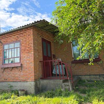 Продаж цегляного будинку