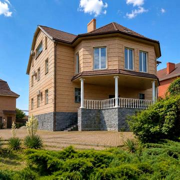 Розкішний триповерховий маєток із власним берегом Дніпра