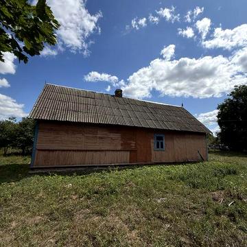 Деревʼяний будинок у с. Дядьковичі