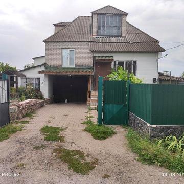 Терміново продам будинок з земельною ділянкою, та ставком.