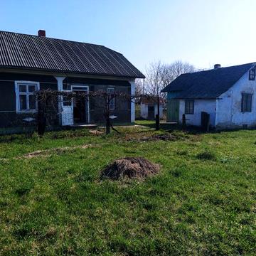 Продається житловий будинок та літня кухня з сараєм
