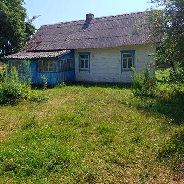 Будинок і земельна ділянка смт. Ємільчине, вул. Соборна 98