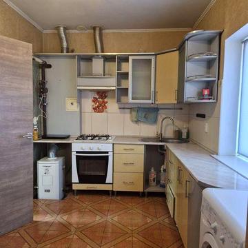 Квартира в частині будинку з окремим входом