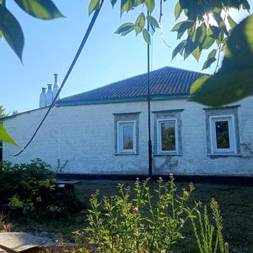 Продам 1/2 половину житлового будинку з ремонтом Зміїв