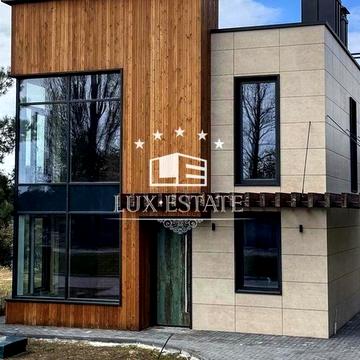 Продажа современного дома на первой линии от воды в коттеджном городке Riviera Village