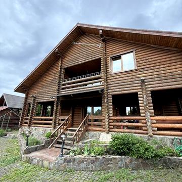 Продаж будинку зі зрубу поруч із ощером та лісом