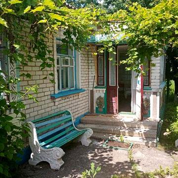 Продаж 1 поверхового будинку з верандою і ділянкою на 10 соток, 81.1 кв. м, 4 кімнати, м.Ладижин