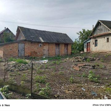 Продам земельну ділянку з будинком