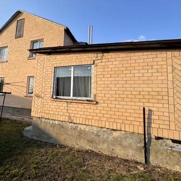 Продам або обміняю половину двоповерхового будинку