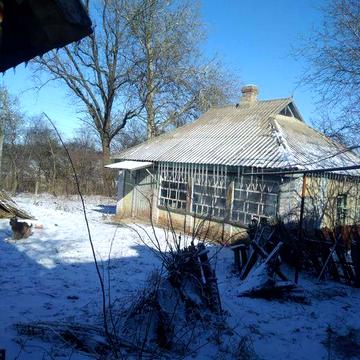 Будинок з земельною ділянкою