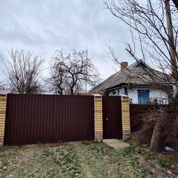 Будинок у центрі с. Глинськ + 50 соток приватизованої землі