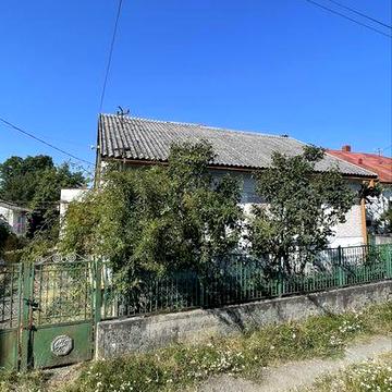 Продаж будинку 10 соток в місті