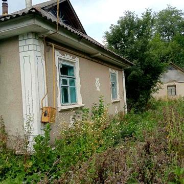 Дві ділянки з будинками 5000 $