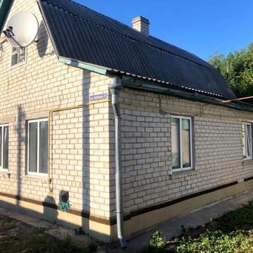 Продам півтора будинку з земельною ділянкою в селі Ставище ,Житомирської області.