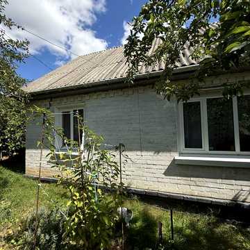 Продам цегляний якісний будинок в центрі смт.Міхайло Коцюбинську