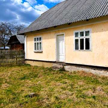 Продаж деревʼяного будинку пл. 150 м2 на ділянці 0.19 га в с. Ст. Мізунь