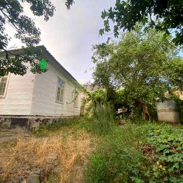 Продам Дом в городе с участком 5,5 соток(торг)