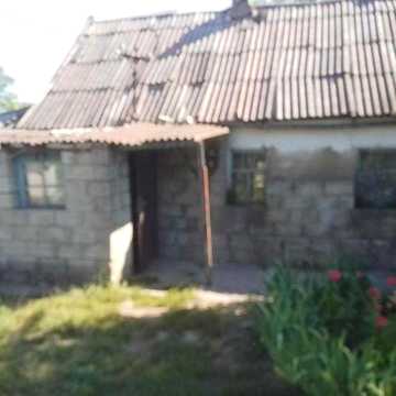 Продам земельну ділянку з будинком