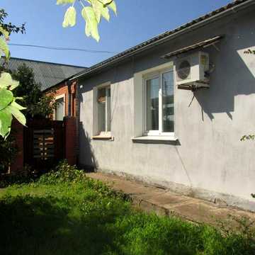 Продам частину будинку по вул. Тітова ( район Дитячої лікарні)