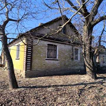 Будинок та земельна ділянка с.Гряди