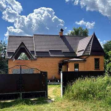 Продається сучасний будинок з усіма зручностями в Полтавській області на березі річки