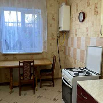 Затишна квартира у будинку котеджного типу