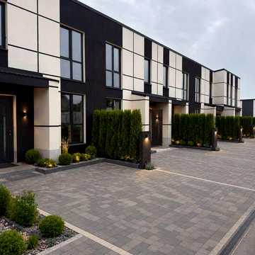 Продам кутовий таунхаус у Гостомелі на вул. Покровській, 104 м², ділянка 2,4 сотки — 70 000 $. Індивідуальне Газове Опалення. Власна Парковка. Без %.