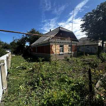 Продам будинок з приватизованою земельною ділянкою  м. Коростень провулок Південний