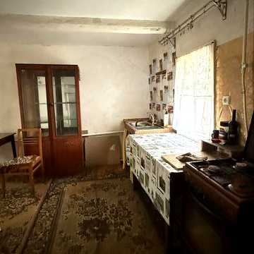 Будинок з ділянкою в Титусівці